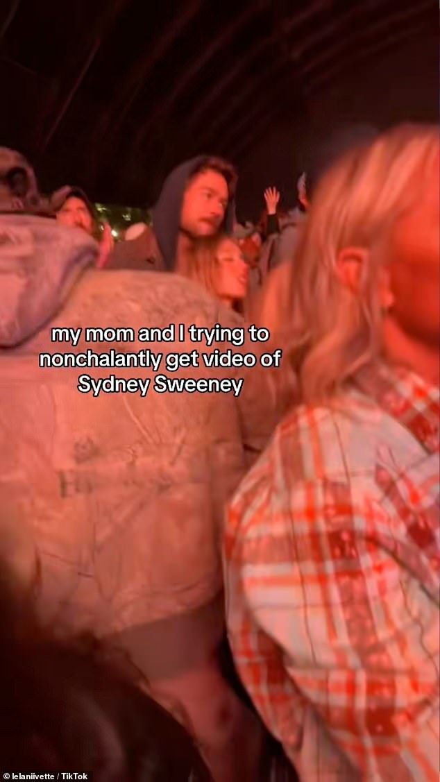 The clip showed Sweeney swaying her head back and forth while mouthing the words to the song, as she looked up at the It Ends With Us actor towering over her with a hoodie on his head
